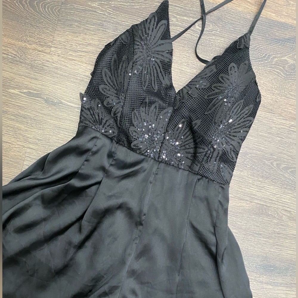 Black sequin and satin open-back romper